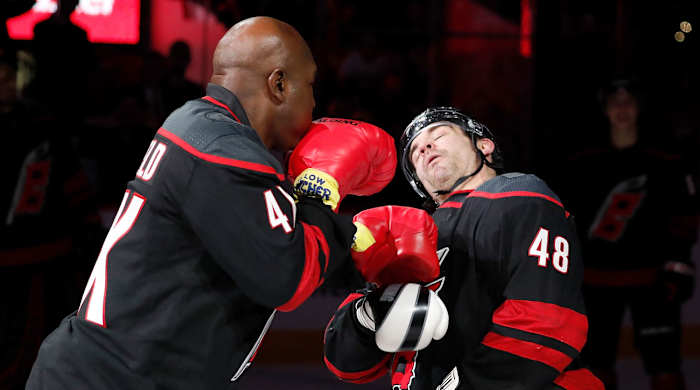 evander-holyfield-storm-surge-celebration-canes-blues.jpg